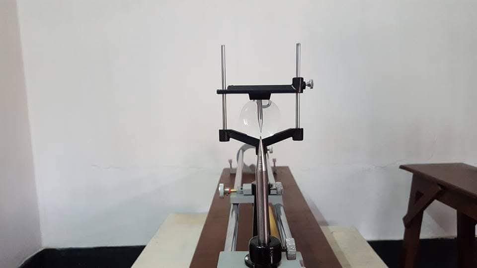 A convex lens on the optical bench in the BIORTON physics lab